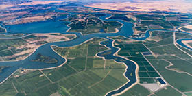 Numerous waterways snake through the delta where the Sacramento River and San Joaquin River meet. Visible in the photo is Bethel Island, Franks Tract State Recreation Area, Mandeville Tip County Park, and Brannan Island State Recreation Area.